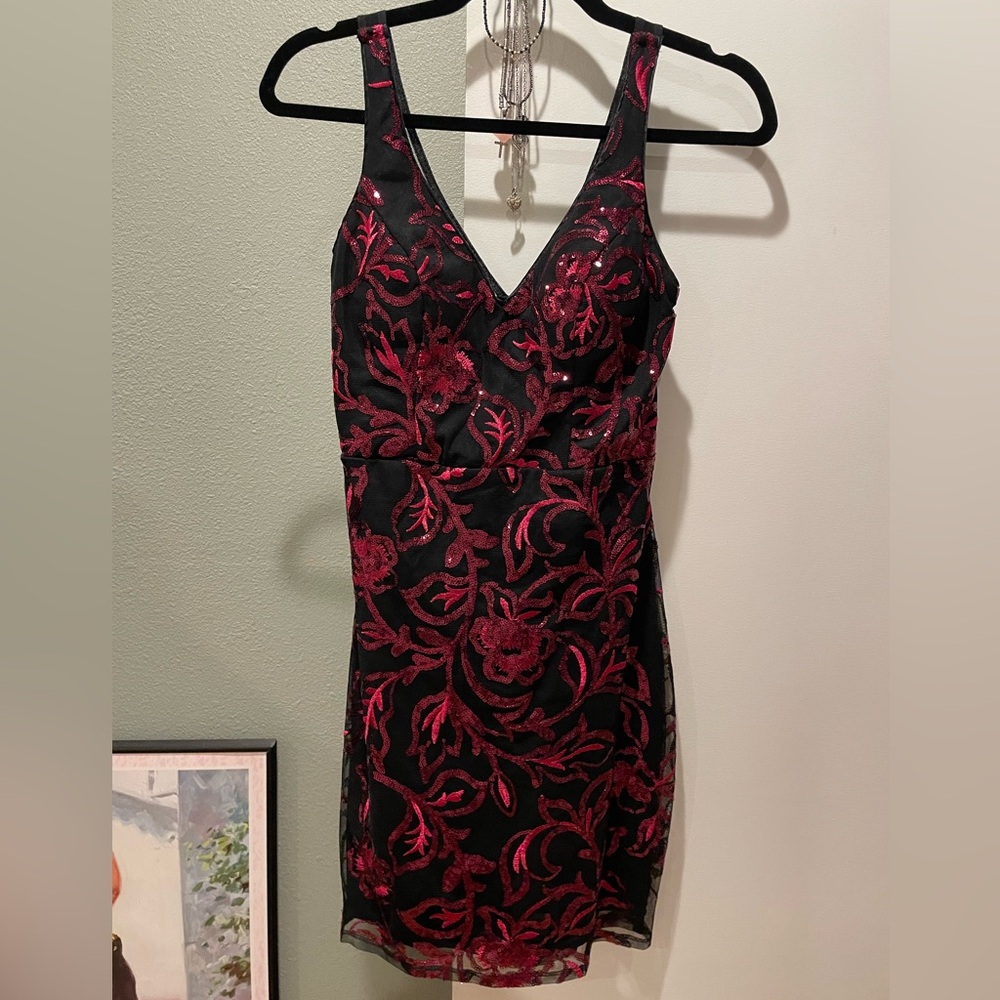 Gorgeous mini fitted dress , black with burgundy sequins